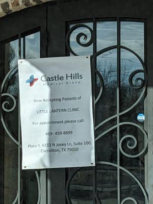 Sign on door says "Castle Hills Medical Group Now Accepting Patients of Little lantern clinic"