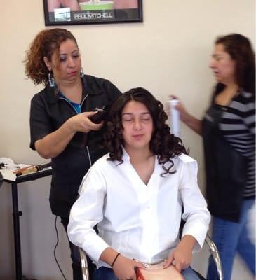 My daughter getting an updo at Hairland.