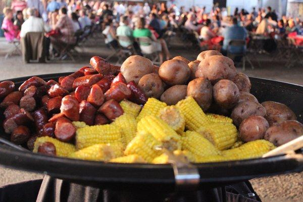 Crawfish Boil Party including potatoes, sausage, and corn