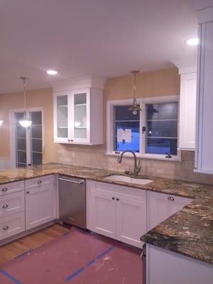 Total kitchen renovation with new lighting and updated outlets and switches