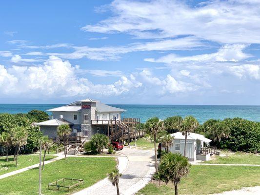 Fishing store and restaurant on beach side of park