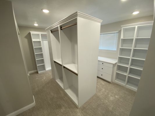 Add cabinets, new carpet, replaced closet doors, added can lighting to turn bedroom into a closet