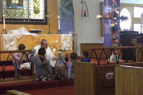 Pastor Ed Miller preaching the children sermon to the little members.