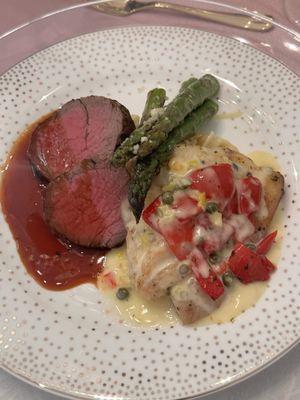 Beef tenderloin with port wine, demi-glace, and herb snapper with lemon caper butter sauce