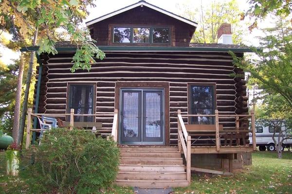 Authentic Log Cabin built in 1918. Rustic charm of days past with modern day conveniences.