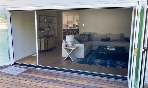 retractable screens at a pool deck