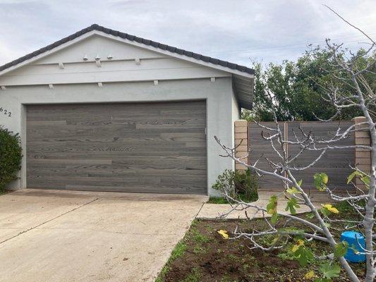 Custom gate to match garage door