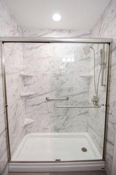 Shower remodel with sliding door.