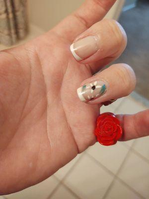 Here is my other nail design with a red dancing together.  Hopefully, they will meet up with the first set of flowers.