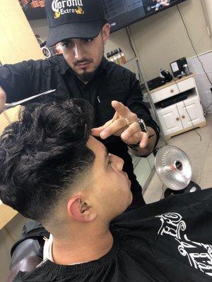 Fresh Fades, @ Silvia's Beauty Salon & Barber Shop. - Marvin The Barber , doing a Fresh Fade.