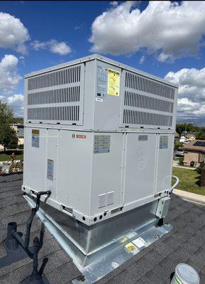 New Heat-pump roof top unit installation.