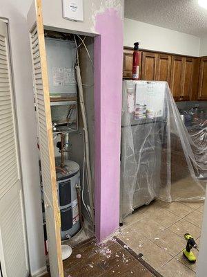 Built entire new corner wall between refrigerator and air handler closet