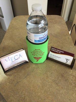 Our check in offer. Receive a free bottle of water and NAC koozie when you check in for your appointment.