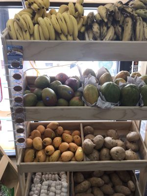 A small produce section at front of store