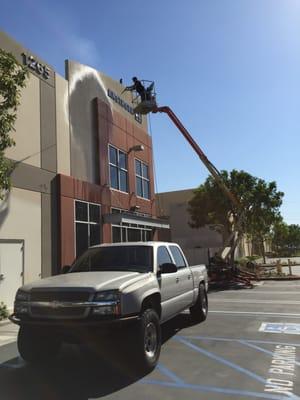 Boom Lift and Pressure Washer to remove bird droppings