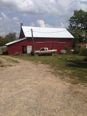 Mile Creek Farm. Barn where Csa boxes are stored in a walk-in cooler.