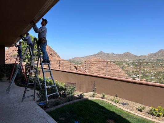 Our team installing a custom square gutter.