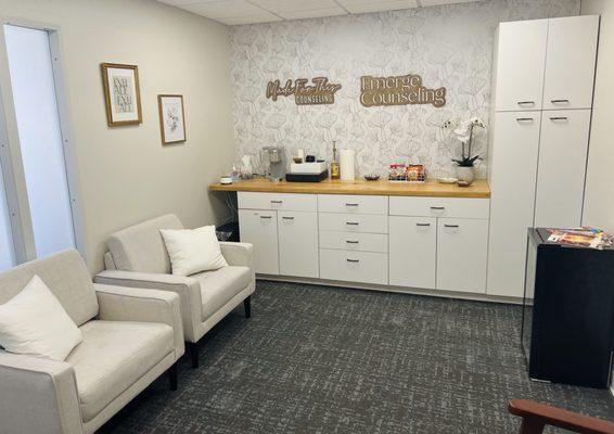 Waiting room with complimentary drinks and snacks available to clients