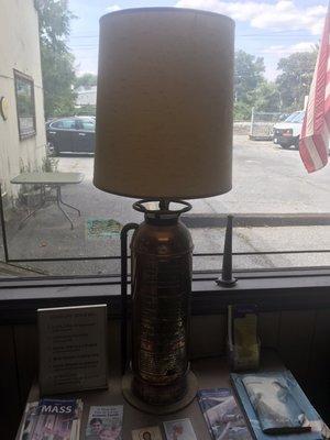 Waiting area with a cool antique lamp made from an old fire extinguisher.