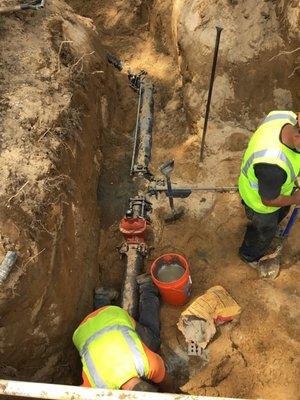 Installation of a commercial water main to a school.