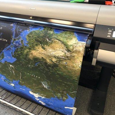 part of large map mural coming out of printer