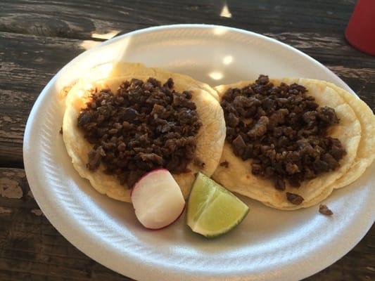 Tacos de asada minus cilantro and onion for my lil boys. Their fave