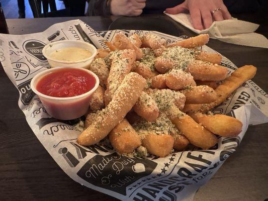 Dunker Dads. Fried bread with garlic and Parmesan cheese with marinara and Alfredo sauce for dunking.