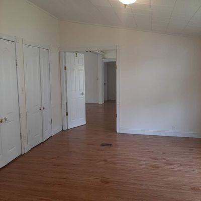 Installed new closet doors, room entrance door, and vinyl plank flooring.  Painted walls and trim