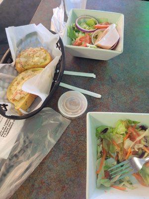 Complementary salad and seafood garlic bread that comes with every dine-in meal.