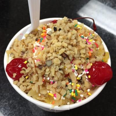 Banana ice cream, sprinkles, pineapple, walnuts & cherries