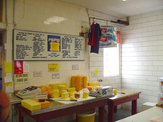 Behind the counter, with price menu