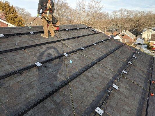 When working on the roof, safety is critical.