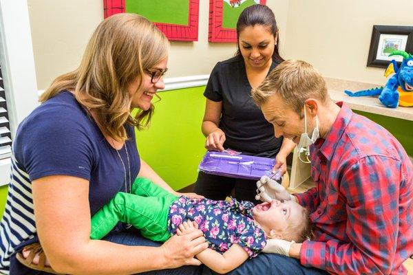 A "lap exam" is common for our youngest patients as a way to examine their teeth while still staying close to mom or dad :)