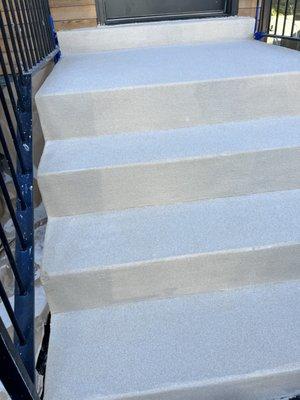 Old set of steps that had cracks and spalling. Mended the cracks and spalling, then coated with quartz to make it look even better than new!