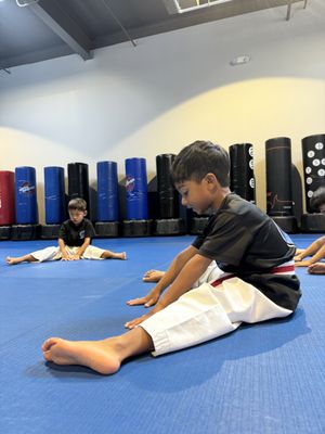 Young students stretching their mind and body in each class.