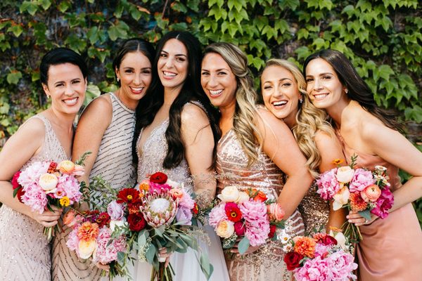 Gorgeous bridesmaids flowers that we repurposed as centerpieces