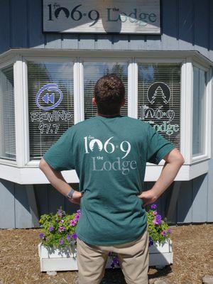 One of our dedicated sales staff modeling our merchandise, outside our station in Ephraim.