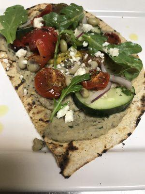 Grilled Flatbread with Black-eyed Pea Hummus, Fire Roasted Peppers, Mint Marinated Cucumbers and Cherry Tomatoes