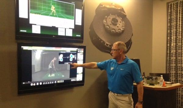 Our Golf Coach reviews the results with a client in our 2D and 3D Golf Room. Interested, Call to learn more about this service.