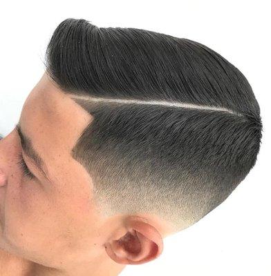 Low skin fade with side part