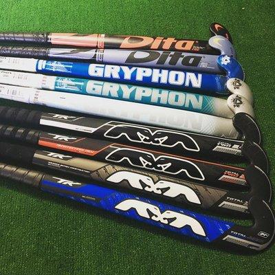 Indoor field hockey sticks.