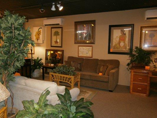 We carry artwork, couches, coffee, tables, mirrors and end tables to furnish your entire living space