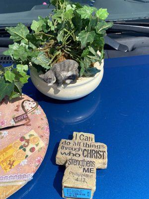 The plant was maybe two dollars. The cross statue was $.54.