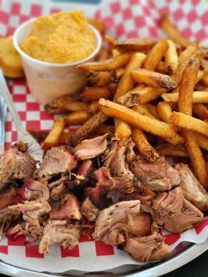 Pulled pork with fries, cheddar grits and corn muffins