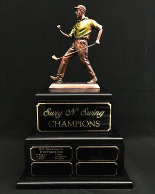 We'd be just as stoked as this golf figure if we won a trophy as awesome as this one!