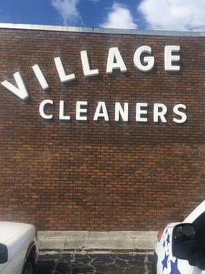 The exterior of Village Cleaners & Tailors