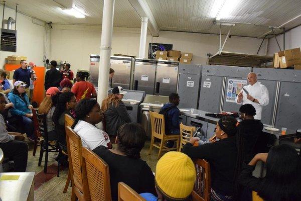 Ypsilanti Schools students recieve lunch and a demonstration from Dorsey Schools Chef @ Peoples Restaurant Equipment Company.