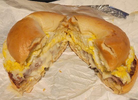 Turkey sausage, egg, and cheese on a plain bagel.