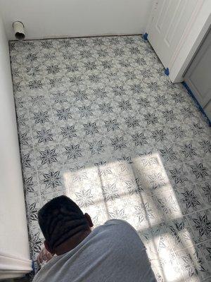 This is one of us installing tile in a laundry room