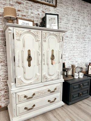 Refinished armoire with distressed milk paint.